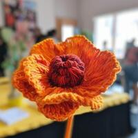 Flowers in background and in vase photo