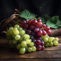 a bunch of grapes on a table with a chalkboard behind it photo