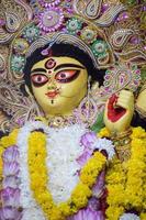 Goddess Durga with traditional look in close up view at a South Kolkata Durga Puja, Durga Puja Idol, A biggest Hindu Navratri festival in India photo