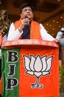 New Delhi, India - March 27 2023 - Piyush Goyal Cabinet Minister and core member of Bharatiya Janata Party - BJP during a rally in support of BJP candidate ahead of MCD local body Elections 2022 photo