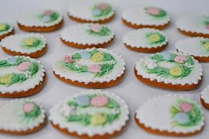 A table with decorated Easter cookies on it photo