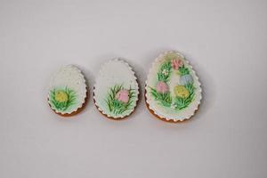 A table with decorated Easter cookies on it photo