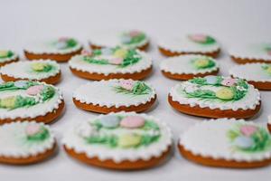 A table with decorated Easter cookies on it photo