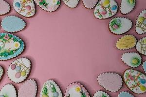 A table with cupcakes with the word Easter on it photo