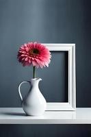 Minimal White Picture Frame Canvas Display With Flower in Vase photo