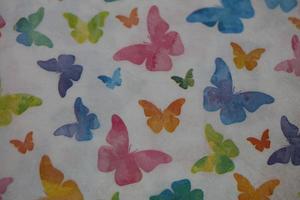 Colorful butterflies on white napkin paper close up background big size high quality instant print stock photography photo