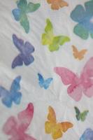 Colorful butterflies on white napkin paper close up background big size high quality instant print stock photography photo