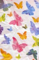 Colorful butterflies on white napkin paper close up background big size high quality instant print stock photography photo