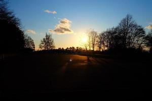 Sunset in the Autumn Park Background. photo