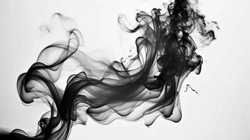Black smoke isolated on white background. Motion. video