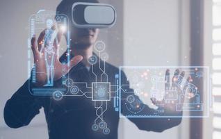 digital technology medical internet connection, man wearing VR glasses working with virtual Global Internet connection metaverse, AI technology medical health tech. photo