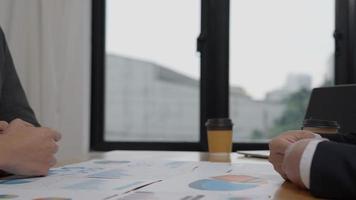 Executives are shaking hand after results success to target. financial data analysis and market growth report chart. Planning Strategies, startup project, profitable strategy, Business meeting time video