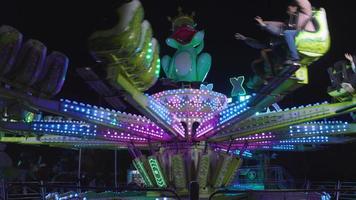 A fast spinning carousel ride at a funfair in barcelona video