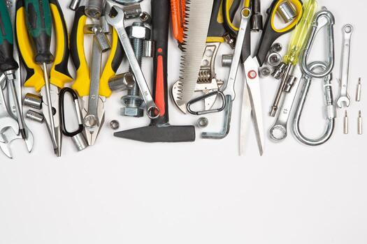 Set of tools for repair in a case on a white background. Assorted work or construction tools. Wrenches, Pliers, screwdriver. Top view photo