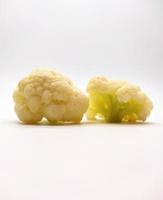 cauliflower pieces isolated in white background photo