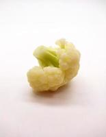 cauliflower pieces isolated in white background photo