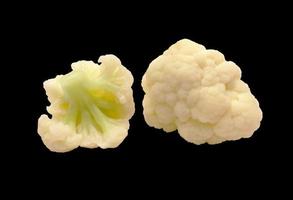 cauliflower pieces isolated in black background photo