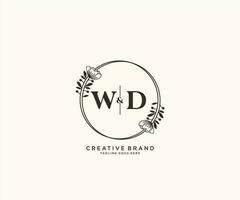 initial WD letters hand drawn feminine and floral botanical logo suitable for spa salon skin hair beauty boutique and cosmetic company. vector