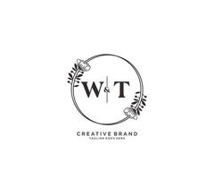 initial WT letters hand drawn feminine and floral botanical logo suitable for spa salon skin hair beauty boutique and cosmetic company. vector