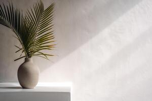 indoor view with pot and palm leaves photo