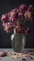 beautiful pink wilted flowers in a vase photo