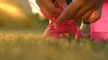 Running shoes - woman tying shoe laces video