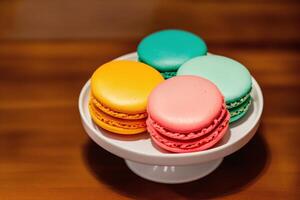 Colorful macaroons on a plate. Sweet cookies. photo