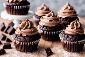 Colorful cupcakes on a white plate on a wooden table. Homemade cupcake with nuts and honey. photo