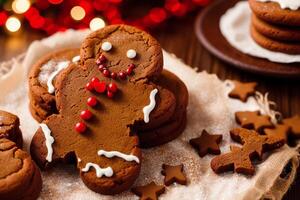 Christmas gingerbread cookies with icing sugar on the background of the Christmas tree. gingerbread man. photo