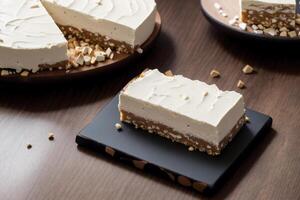 Close up of a chocolate nougat on a wooden table. photo