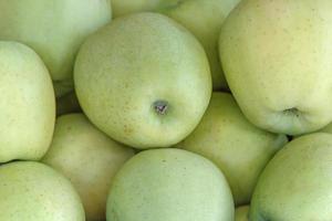 close up of heap of green apples photo