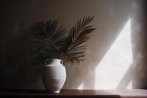 indoor view with pot and palm leaves photo