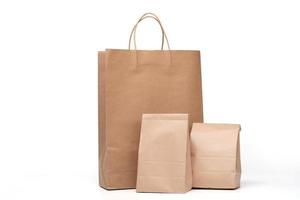 Group of lunch Paper bag and shopping paper bags isolated on a white background photo