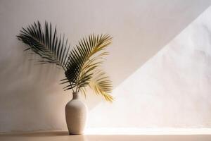 indoor view with pot and palm leaves photo