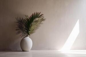 indoor view with pot and palm leaves photo