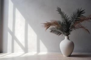 indoor view with pot and palm leaves photo