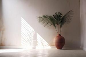 indoor view with pot and palm leaves photo