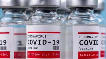 A macro video of glass vials of the covid-19 vaccine