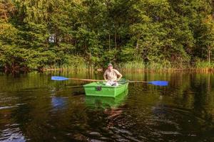 Fisherman in a boat photo