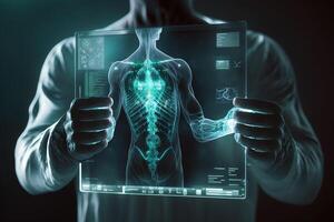 The doctor is holding a holographic X-ray of the human body. photo