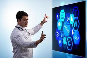 Medicine doctor and stethoscope in hand touching icon medical network connection with modern virtual screen interface, medical technology network concept and two doctor photo