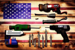 Happy labor day, Tools group different job on rustic wooden table, colorful with USA Flag. photo