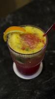 Virgin Strawberry mojito mocktail consist of soda water, strawberries, lime juice, sugar, mint leaves. photo