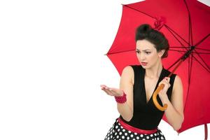 Retro girl with red umbrella look weather. photo