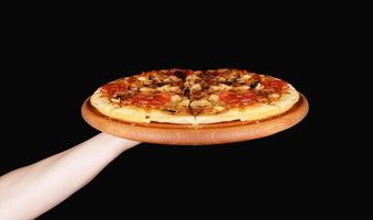 Tasty pizza in wooden plate photo