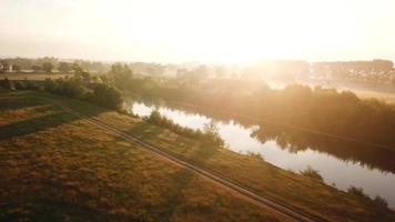 Aerial view of the river covered with fog at dawn. Ukraine video