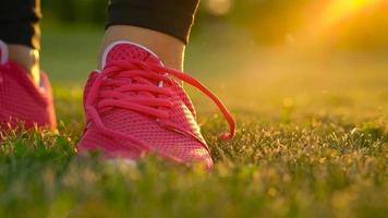 Running shoes - woman tying shoe laces video