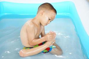 kids playing in hot water Watch your feet feel like you're stepping on something. photo