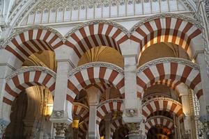 Interior of Mezquita - Mosque - Cathedral of Cordoba in Spain photo