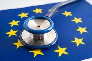 Stethoscope on EU flag background, Business and finance concept. photo